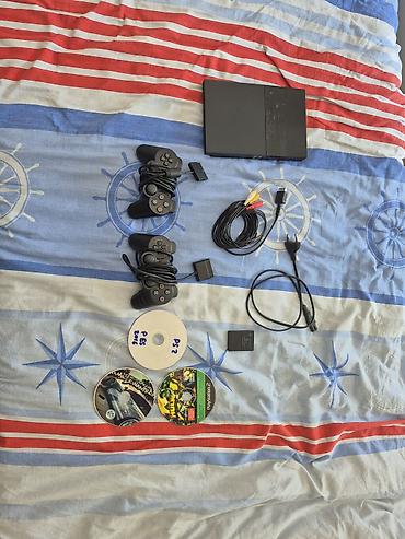 PS2 & PS1 (Sony PlayStation 2 & 1): Sony PlayStation 2 Slim komplekti Paketə daxildir: - PS2 Slim konsolu — 1