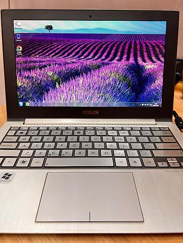 ucuz notebook: ASUS UX21 Series Ultra Slim ultrabuk - 11.6" ekran, yuxarı hissədə — 2