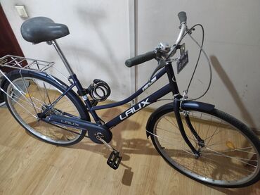 велосипеди с ручкой: Новый городской велосипед.11 тыс.сом.Цвет тёмно-синий, с