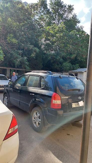 hundai tukson: Hyundai Tucson, qara rəng, 5 qapılı SUV. İli 2006-nın sonu(2007 — 5