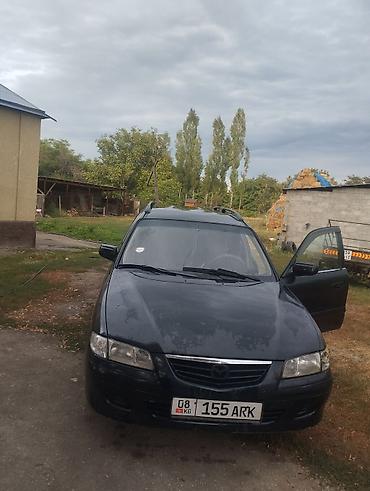 степ аэробика: Mazda Capella: 2000 г., 1.8 л, Механика, Бензин, Универсал — 3