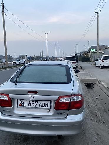 mini coper: Mazda 626: 1999 г., 1.8 л, Механика, Бензин, Седан — 4
