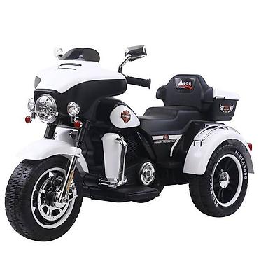 oyuncaq it: Yeni model uşaq elektrik motosikleti. üç təkərli akkumulyatorlu uşaq — 7