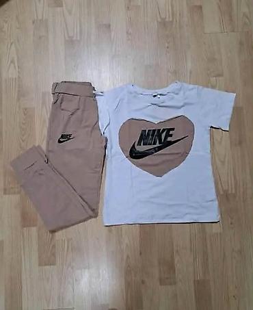 walkmax patike: Komplet NIKE majica i donji deo trenerke. -Bela majica kratkih rukava — 7