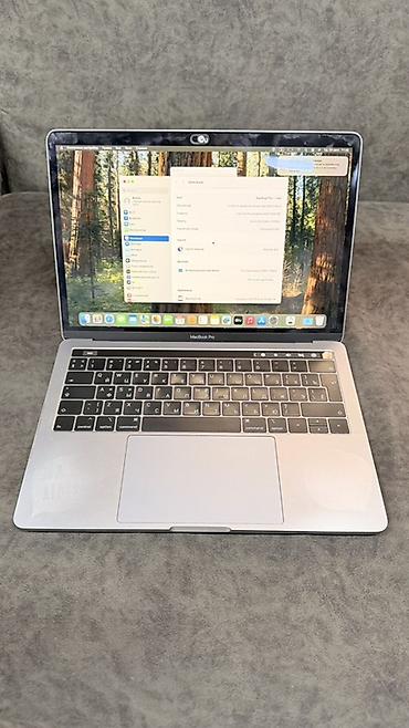 Ноутбуки Apple (MacBook): MacBook Pro 13" (серебристый) с Touch Bar Характеристики: - Экран — 1