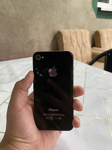 IPhone 4, черный, стеклянный корпус с логотипом Apple. Ключевые