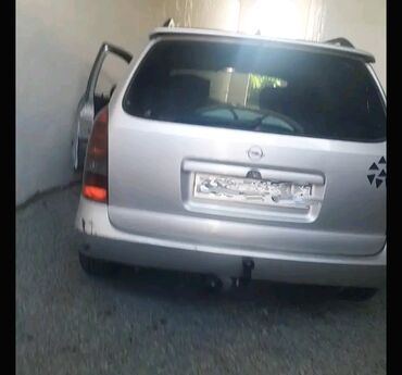 фольксваген поло хэтчбек: Opel Astra Caravan (Universal) – gümüş rəng Xüsusiyyətlər: - Kuzov