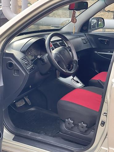 Hyundai: Hyundai Tucson: 2 l | 2005 il Krossover — 5