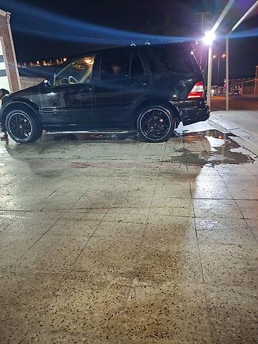 Mercedes-Benz: Mercedes-Benz M-Class (W163) SUV - Kuzov: qara rəng, şəhər və uzun — 10