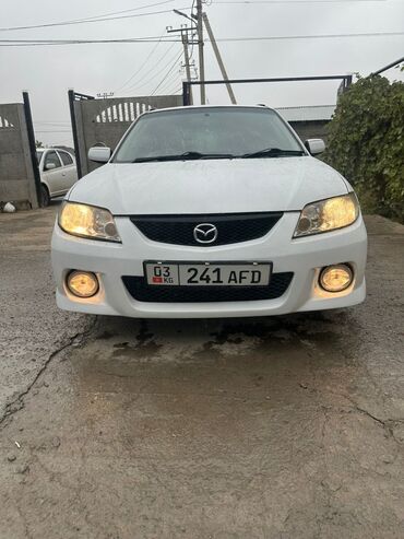 бампер спейс стар: Mazda Familia: 2002 г., 1.5 л, Автомат, Бензин