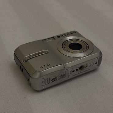 manqal balaca: Samsung S760 rəqəmsal fotoaparat Vəziyyəti haqqında: Korpusunda — 2