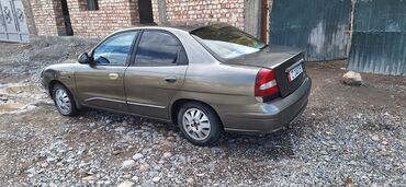 Daewoo: Daewoo Nubira: 2000 г., 1.6 л, Механика, Бензин, Седан