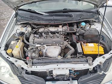 Продажа авто: Nissan Primera: 2003 г., 2 л, Механика, Бензин, Хэтчбэк — 8