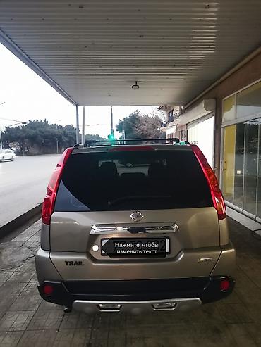 jetta 2008: Nissan X-Trail model avtomobili. Açıq qəhvəyi rəngdə, dam relsləri ilə — 3