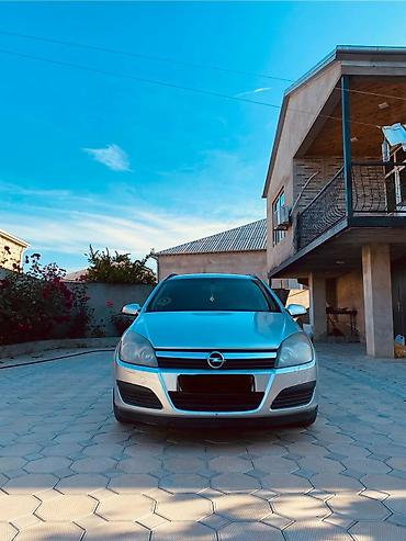 opel astra qiyməti: Opel Astra Caravan (Universal) – gümüşü rəng Texniki xüsusiyyətlər və — 4