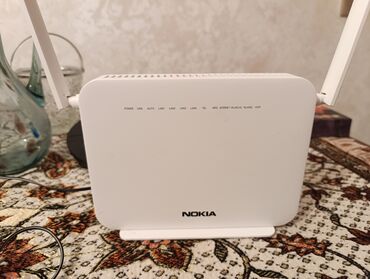 adsl 2 modem: Nokia markalı Wi‑Fi router Xüsusiyyətlər: - İki ədəd tənzimlənən