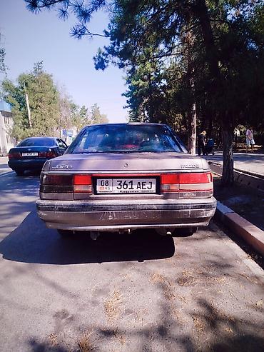rox 01: Mazda 626: 1989 г., Седан — 1