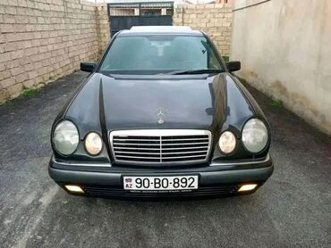 mersedes 303: Mercedes-Benz E 230: 2.3 l | 1996 il Sedan