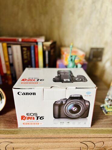 Fotokameralar: Amerikadan getirilib, pakovkadi, islenmeyib. cantasi da var