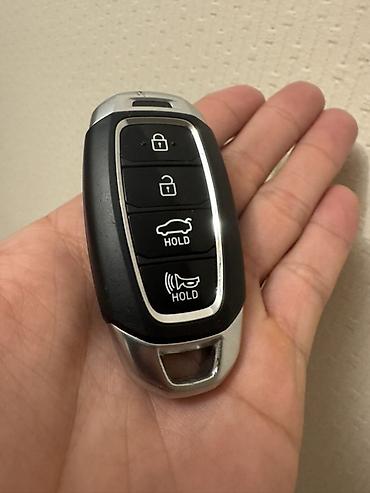 брелок для ключей авто: Смарт-ключ Hyundai с 4 кнопками: - Запирание дверей - Отпирание дверей — 1
