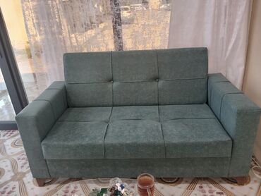 dəri divan: Диван