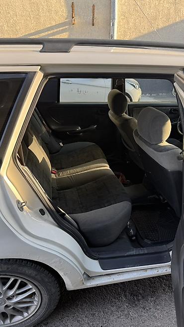 мото зонтик: Mazda Capella: 1999 г., Универсал — 9