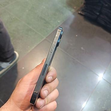 Apple iPhone: IPhone 15 Pro, Natural Titanium, Simsiz şarj — 9