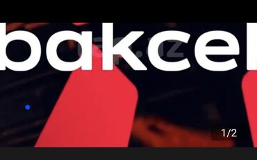 рекламный баннер: Bakcell şirkətinin reklam banneri. Banner qırmızı və qara rənglərdən