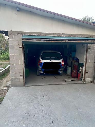 Продажа коттеджей и домов: Продается дом 7,7 соток 53 кв.м + времянка + гараж + баня Центральная — 5