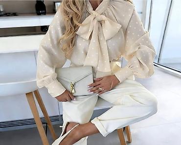 Bluze: 🔥Ženska elegantna bluza sa mašnom i tufnama
✅2400 din — 9