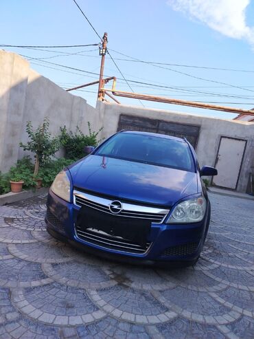 Opel: Opel Astra H Caravan (universal), göy rəng. - Kuzov: universal — 1