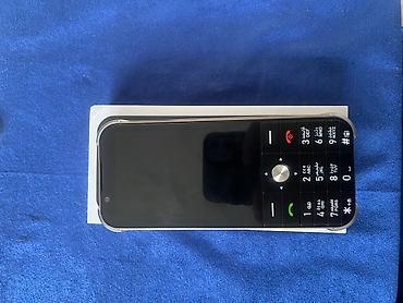 alcatel tkee mini: Məhsul: Düyməli “feature phone” – smartfon görünüşlü korpusda — 2