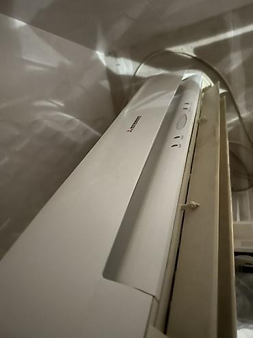 kond: Mitsubishi Electric divar tipli kondisioner (split sistemin daxili — 2