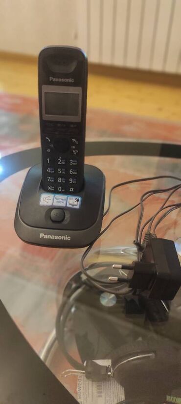 ishlenmish telefonlar: Stasionar telefon Panasonic, Simsiz, Yeni