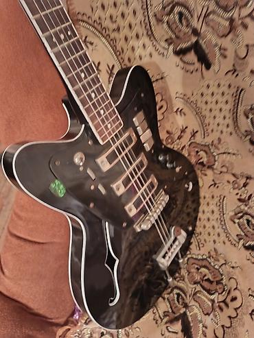 Elektro gitaralar: Elektron gitara, 6 sim, İşlənmiş, Ünvandan götürmə — 2