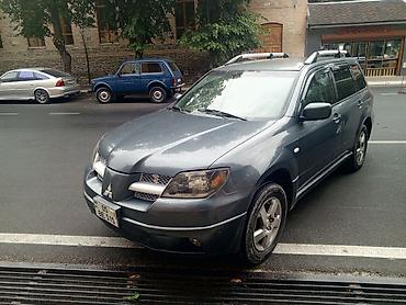 mercedesbenz masin: Mitsubishi Outlander, tünd boz rəng, 5 qapılı krossover/SUV. Əsas — 4