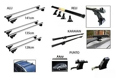 Ostalo: Univerzalni krovni nosači za automobil – set prečki i stopa Opis: - — 7