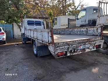 Услуги эвакуатора: Бортовой грузовик Hino Ranger (Atlas), длиннобазный длина борта 5-метр — 3