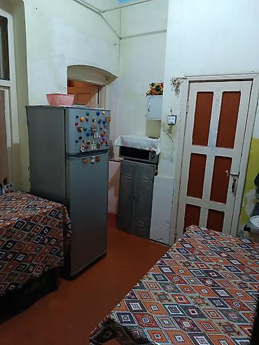 bayilda ev: 55 kv metr sahesi olan bina evinin 1ci mərtebəsi 2otaqlı ev.Heyetde — 2