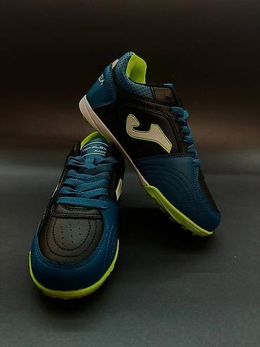 Бутсы: Сороконожки Joma белого цвета с синими вставками. Отлично подойдут — 6