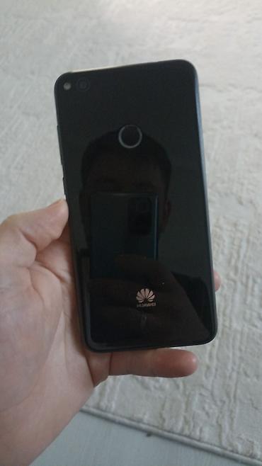 редми ми: Huawei P8 Lite, Б/у, 16 ГБ, цвет - Черный — 1