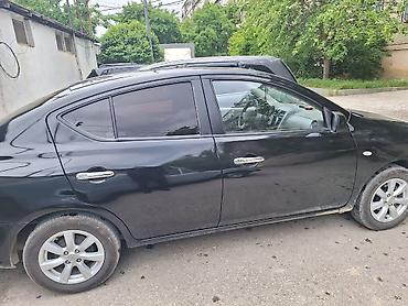 2012 07: Nissan Sunny: 1.5 l | 2012 il Sedan — 7