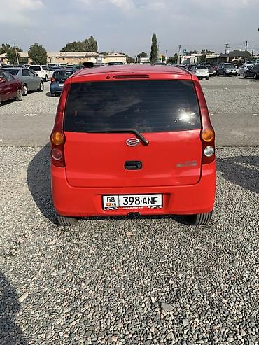 265 70: Daihatsu Cuore: 2009 г., 1 л, Механика, Бензин, Хэтчбэк — 4