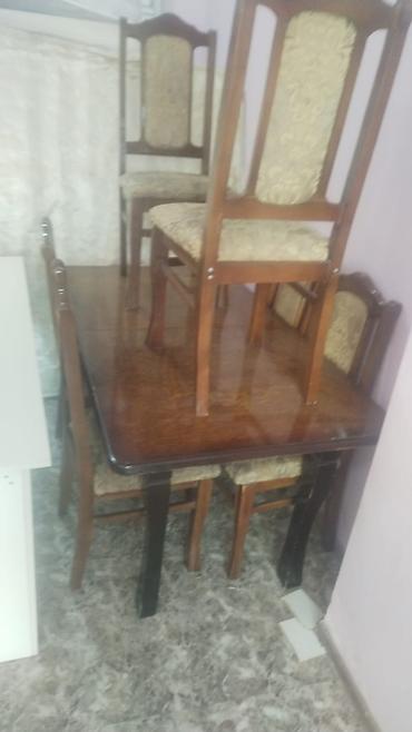 Açılan masa 6 stulu ile birge satılır yaxşı veziyyetdedr 250manat