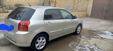 Toyota: Toyota Corolla hatchback (E12) – gümüşü rəng. - Kuzov: 5 qapılı — 4