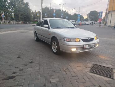 дополнительная фара: Mazda 626: 1999 г., 2 л, Механика, Бензин, Хэтчбэк