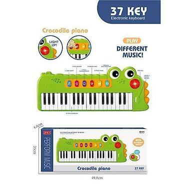 crop haljine: Krokodil sintisajzer – muzički instrument za decu Opis: - Zabavan — 1