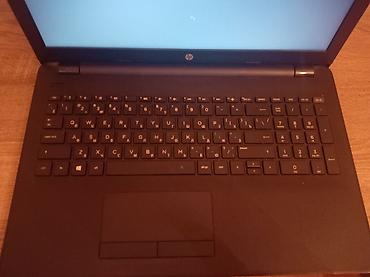 komputerlər ucuz: HP noutbuk - Marka: HP - Korpus: mat qara, teksturalı səth, HP loqosu — 2