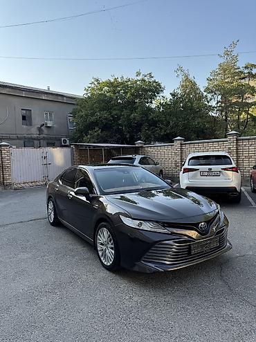 byd e2 2025: Toyota Camry: 2018 г., 2.5 л, Вариатор, Гибрид, Седан — 3