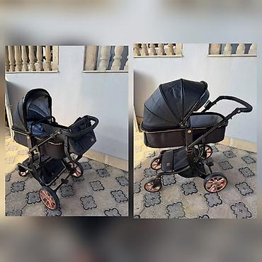 Kalyaska 160 azn Kalyaskanin ustunde cantası, əlcəyi, yağmurluq